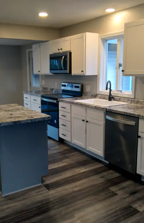 remodeled-kitchen-with-new-flooring-countertop-and-cabinets-syracuse-in